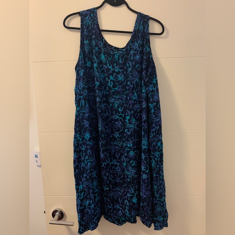 Blue mini dress with tie back. Great print and flattering fabric.